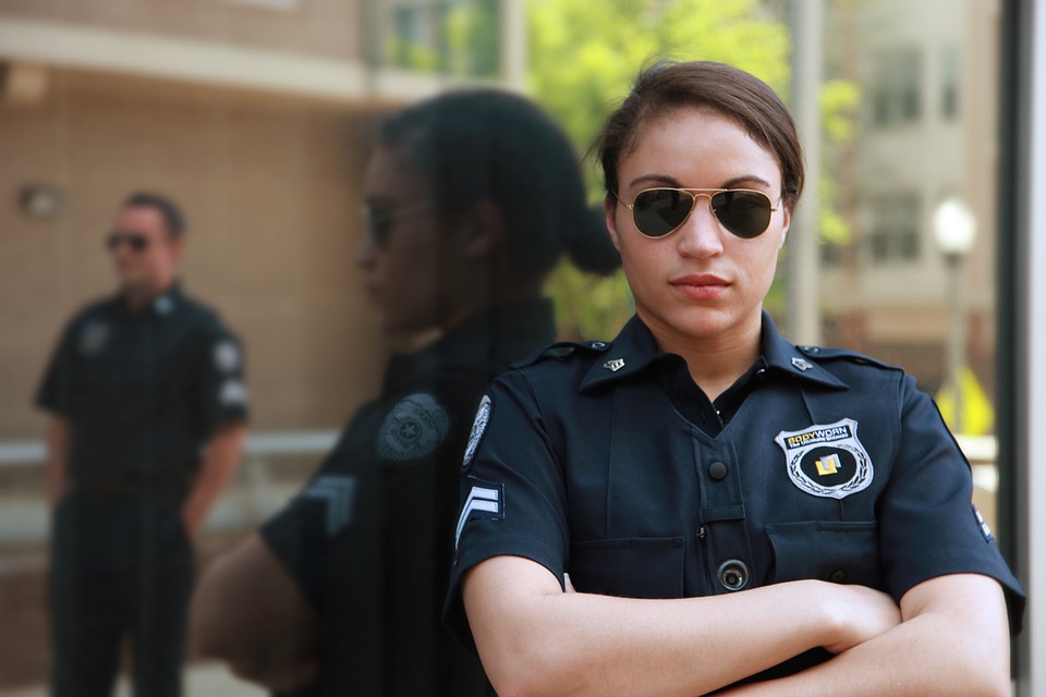 female police officer with body camera